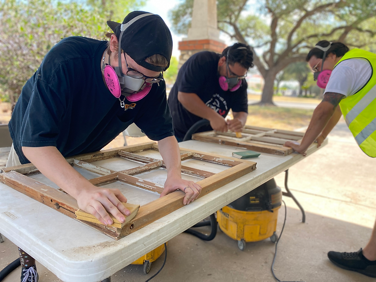 Men working on historic window sash